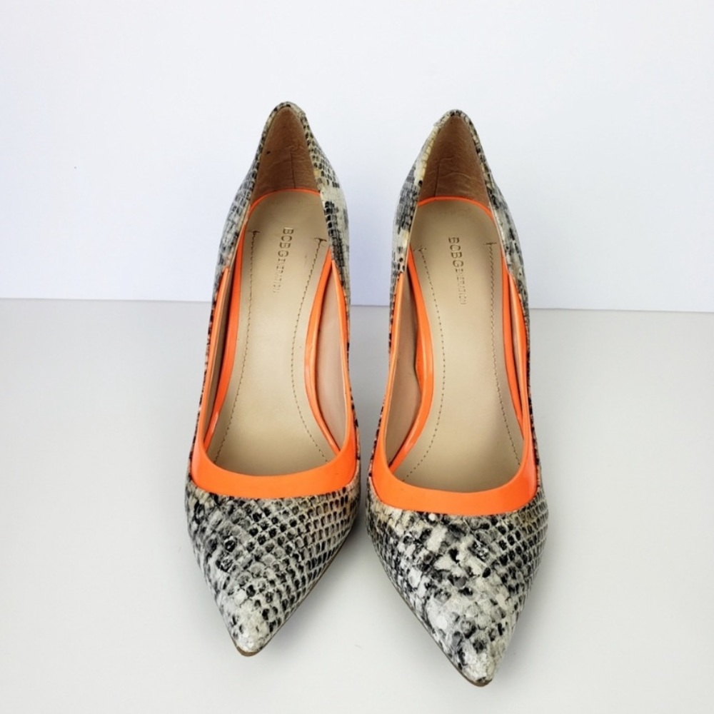 Snakeskin pumps with orange neon accent